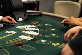 Joker Gaming integrated menu showing slot titles, live-dealer tables, and sportsbook sections